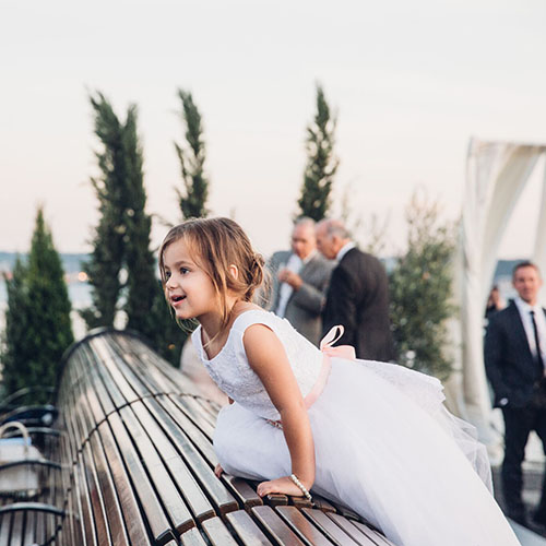 bridesmaid climbing on bench